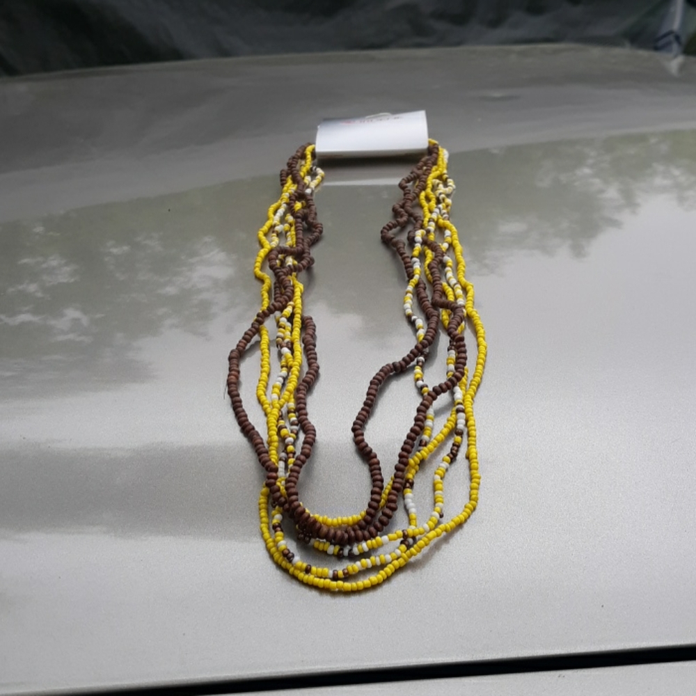 Set of 6 beaded necklaces.